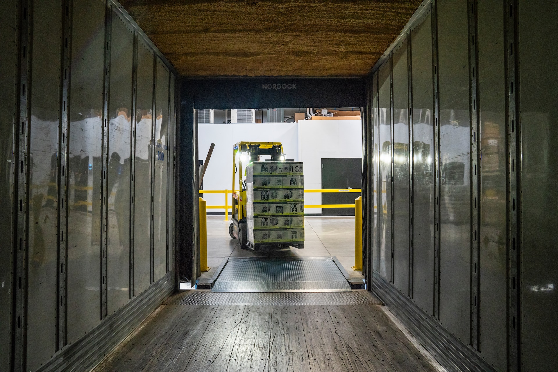 Yellow and black forklift during daytime